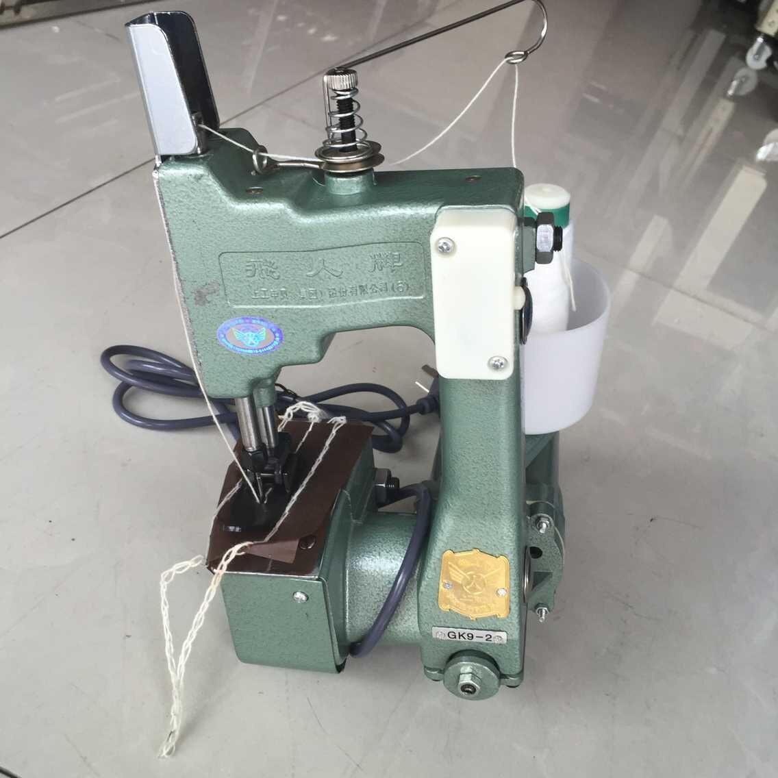 直銷飛人牌手提電動封包機槍式縫包機蛇皮袋封口機編織袋封包機