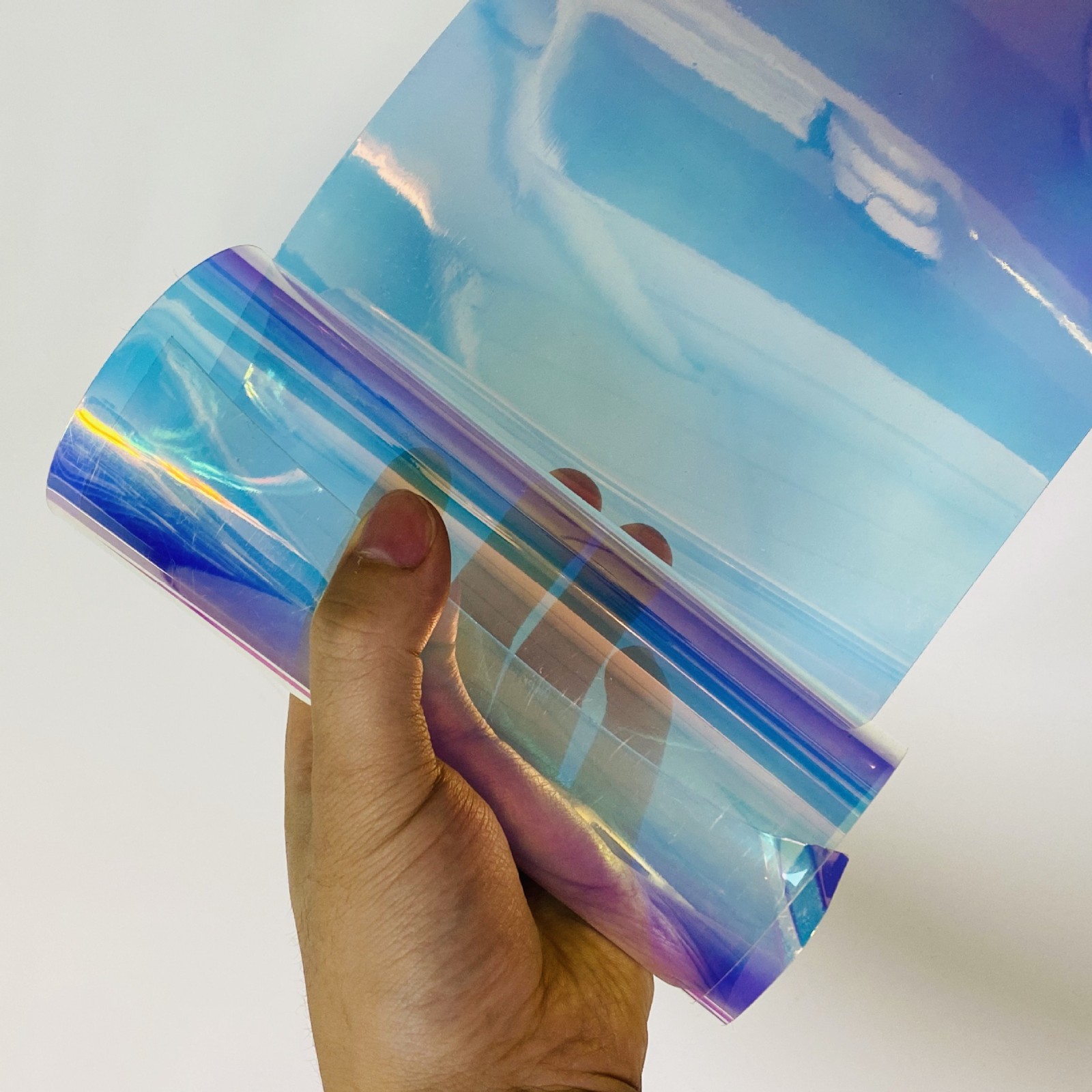 廠家直銷炫光七彩色鐳射pvc硬片透明0.35mm幻彩膠片化 妝盒裝飾材
